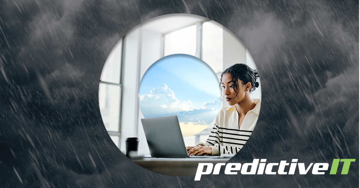 Business professional working on laptop with storm background symbolizing risk management and predictive analytics solutions by predictiveIT.