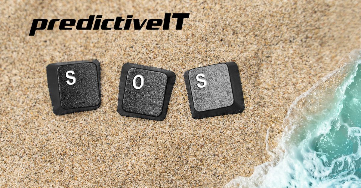 SOS keyboard keys on beach sand representing emergency IT support and disaster recovery services