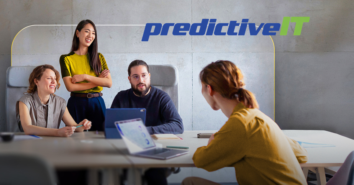 Business professionals collaborating in an office meeting, representing employee onboarding, IT setup, and technology planning for new hires.